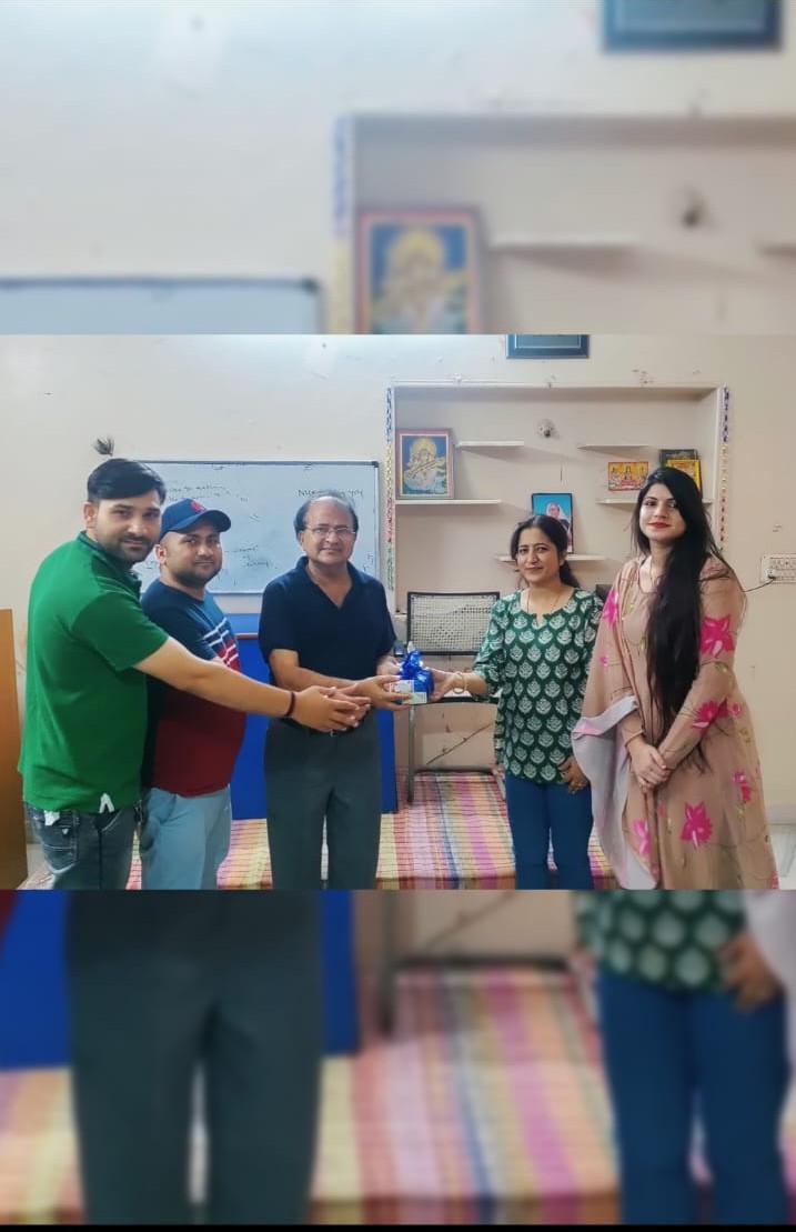 Students presenting a gift to their teachers